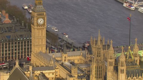 Aerial shot of the famous landmark Big Ben and Houses of Parliament in London's city of Westminster, situated by the side of the river Thames.