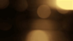 Sparkling gold yellow bokeh particles float on a dark background, creating a mesmerizing and elegant abstract effect. Perfect for festive and luxury themes. - Powered by Shutterstock - Get 15% off with code: PIKWIZARD15