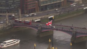 Aerial view over Lambeth bridge which crosses the River Thames in London, England. The bridge is just along the embankment from the famous landmark the Houses of Parliament - Powered by Shutterstock - Get 15% off with code: PIKWIZARD15