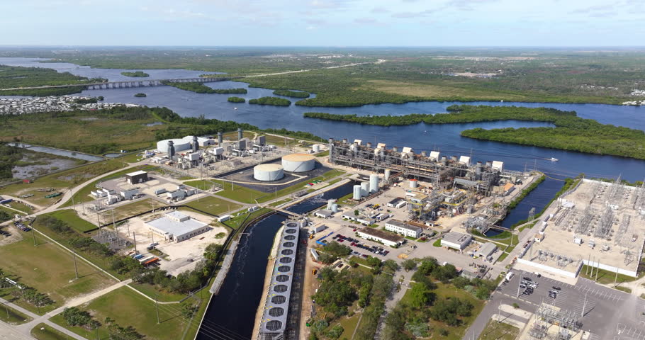 Natural gas fired power plant producing electricity. Oil fossil fuel usage for energy production