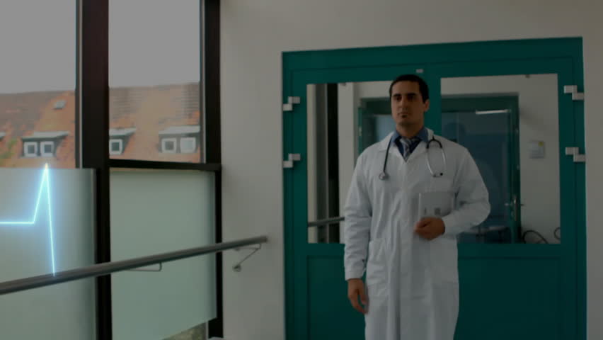 Animation of cardiograph over biracial male doctor walking in hospital. Global medicine, healthcare, science, computing and digital interface concept digitally generated video. - Powered by Shutterstock - Get 15% off with code: PIKWIZARD15