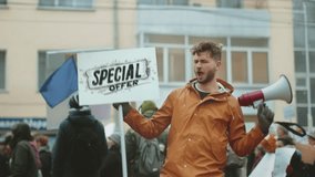 Funny man hold black Friday flash sale banner city street. Crazy male person wave big special offer promo placard. Promotion poster mock up. Joy fun guy show seasonal ad. Hot price off day. Art advert - Powered by Shutterstock - Get 15% off with code: PIKWIZARD15