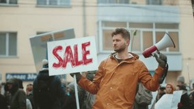 Funny man hold black Friday flash sale banner city street. Crazy male person wave big special offer promo placard. Promotion poster mock up. Joy fun guy show discount ad. Hot price off day. Red advert - Powered by Shutterstock - Get 15% off with code: PIKWIZARD15