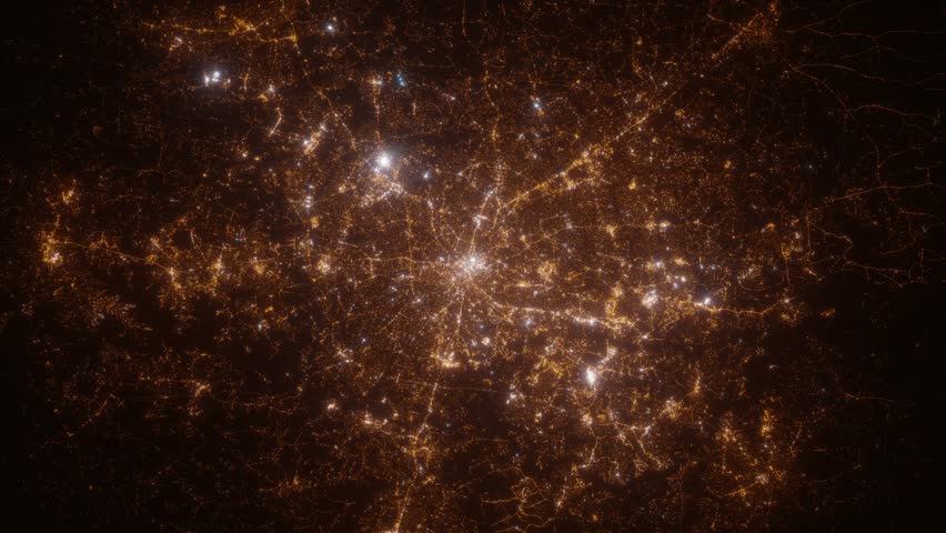 Charlotte (North Carolina, USA) top view at night. Top view on modern city with street lights and glow effect. Camera is zooming in, rotating clockwise. Vertical video. The north is on the left side