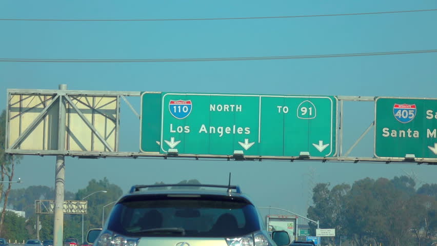 Car POV on road sign in Los Angeles in slow motion 120fps