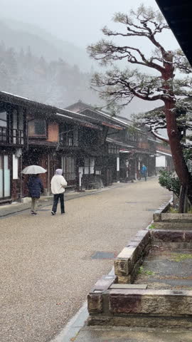 View of Narai-juku in autumn season. Narai juku is a historic post town along the Nakasendo route in the Kiso Valley of Nagano Prefecture, Japan. 