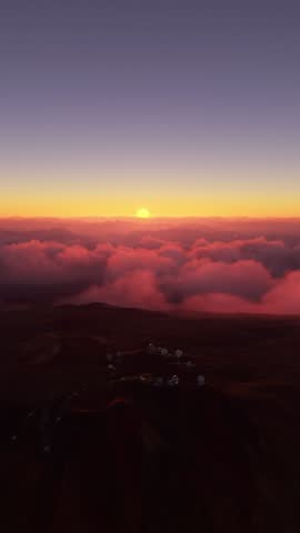 3D - Aerial view at sunset flying over Mauna Kea observatory in Hawaii. United States of America