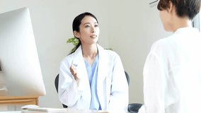 Smiling doctor examining a patient - Powered by Shutterstock - Get 15% off with code: PIKWIZARD15