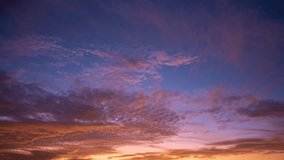 Sunset with sun and clouds time lapse. Dramatic sky with sun rays. Night Sky timelapse. Moving clouds at sunset. Evening Clouds. Dusk twilight sky time lapse. Dramatic sky. - Powered by Shutterstock - Get 15% off with code: PIKWIZARD15