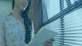 Animation of financial data processing over caucasian businesswoman using tablet in office. Global business, finances, computing and digital interface concept digitally generated video. - Powered by Shutterstock - Get 15% off with code: PIKWIZARD15