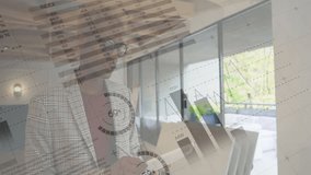 Animation of financial data processing over african american businessman taking notes in office. Global business, finances, computing and digital interface concept digitally generated video. - Powered by Shutterstock - Get 15% off with code: PIKWIZARD15