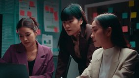 Three asian businesswomen having a heated discussion during an office meeting. They are debating over a business strategy - Powered by Shutterstock - Get 15% off with code: PIKWIZARD15