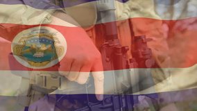 Animation of flag of costa rica over biracial male soldier. Military service, patriotism and national flags concept digitally generated video. - Powered by Shutterstock - Get 15% off with code: PIKWIZARD15