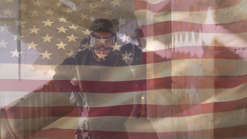 Animation of flag of usa over diverse male soldiers. Military service, patriotism and national flags concept digitally generated video.