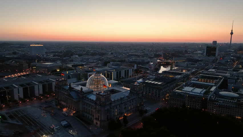 Aerial view of famous places landmarks Reichstag, TV Tower at sunrise. City of Berlin, Germany architectural from above.
