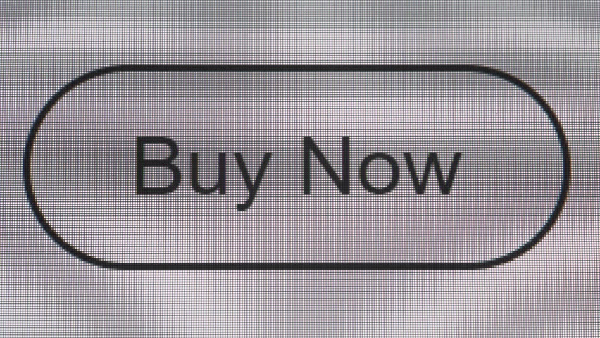 Clicking buy now button on the white computer screen. Close up.