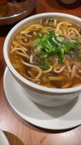 A bowl of sweet and sour soup from Din Tai Fung.