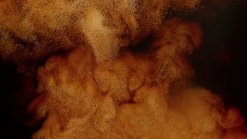 Super Slow Motion Detail Shot of Swirling Coffee Cream at 1000fps.