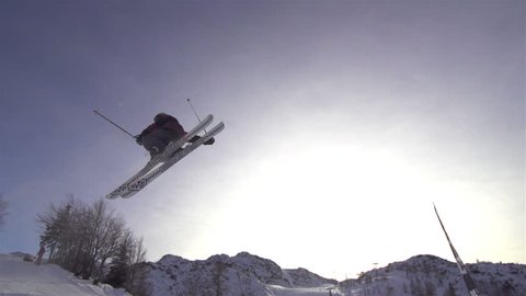 SLOW MOTION: freestyle skier jumping