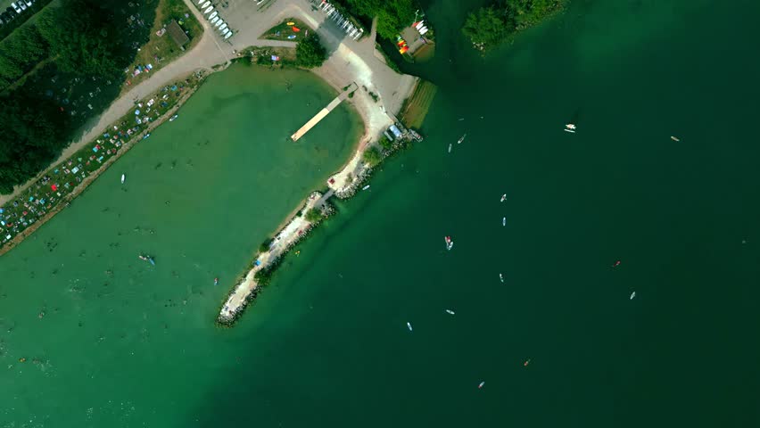 Aerial top down view of Annecy, the Plage d'Albigny lake beach and Annecy-le-Vieux area, France