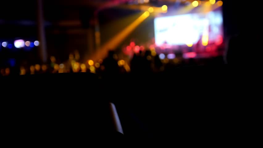 People at a rock concert, De-focused background