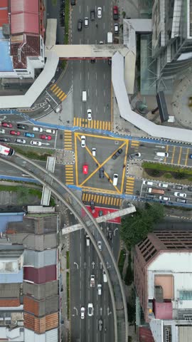 Aerial view of traffic at an intersection in downtown Kuala Lumpur, Malaysia