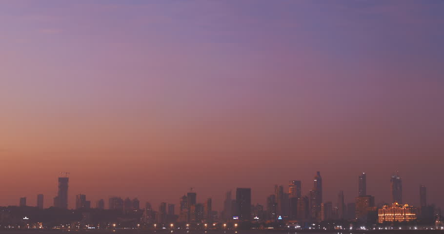 Mumbai, India. Evening City Skyline From Marine Drive Time Lapse, Timelapse, Time-lapse. Skyscrapers And Saifee Hospital In Night Illuminations. Back Bay Coast Of Mumbai City. Zoom Out. Purple Magenta