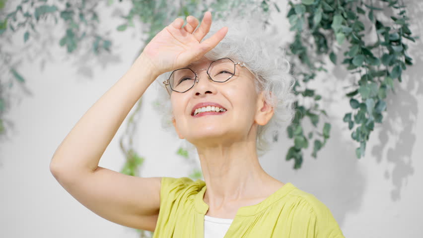 Senior woman wearing a yellow dress