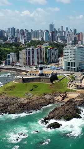 Barra Lighthouse At Salvador Bahia Brazil. Aerial View Of A High-Rise Buildings And Traffic Showcasing Urban Life. Shore Clouds Sky Beach Sea. Shore Tropical Environment. Salvador Bahia.