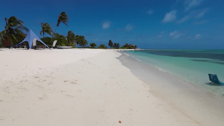 People Enjoy Tropic Beach On A Summer Vacation, slow motion Los Roques Venezuela