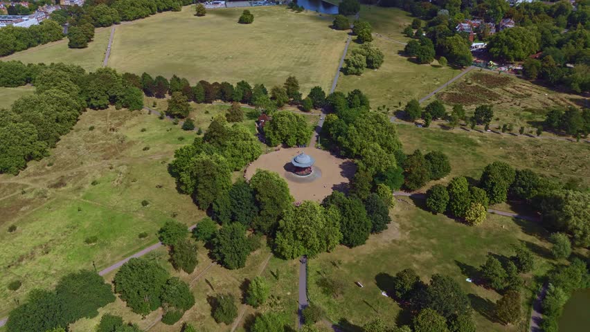 Aerial view of Clapham Common, London. Shot moves around Gondola.