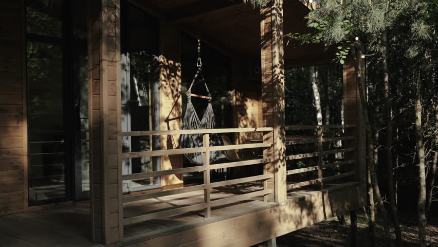 This modern cabin is surrounded by nature, offering a perfect haven for relaxation