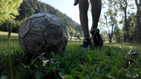 Boy playing with a soccer ball in a sunny garden - Powered by Shutterstock - Get 15% off with code: PIKWIZARD15