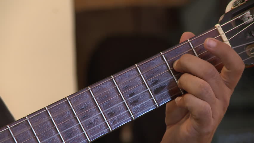 Man Playing a Classical Guitar in La Pampa, Argentina. Close Up.
