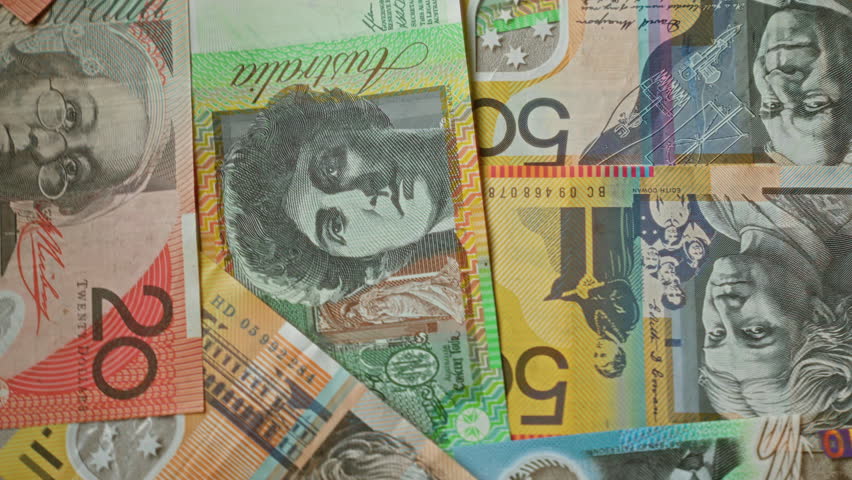 Australian banknotes in various denominations showcasing vibrant colors and detailed designs, highlighting the currency from australia in a close-up shot