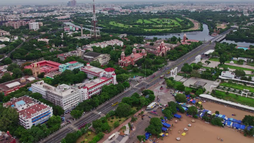 aerial view of kamarajar promenade with government buildings, University of Madras, Ezhilagam, Water Supply Drainage Board, Napier Bridge, island, etc in chennai, tamil nadu, india. drone shot, 4k