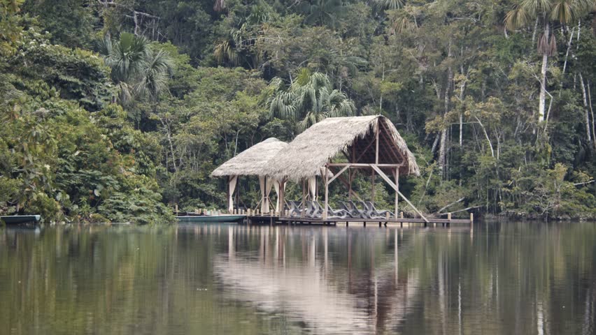 Small pavilion on water, part of expensive eco lodge hotel in rainforest