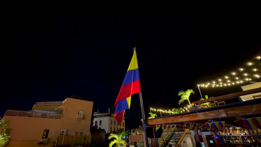 View of the beautiful waving flag of Colombia and Cartagena 