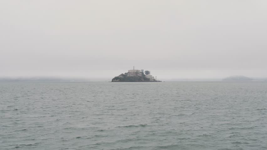 Slow motion landscape of Alcatraz Island San Francisco historic museum jail prison city tours Embarcadero California USA America travel tourism landmark attraction