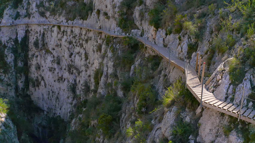 Drone view of the interior of the gorge in the town of Relleu, with its popular wooden walkway, anchored to the walls of the gorge, 80 metres from the bottom.