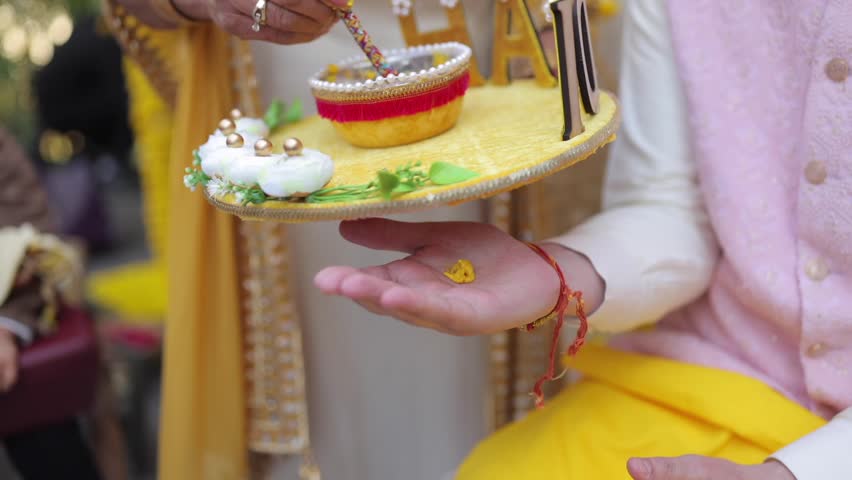 A shot of an Indian Wedding where rituals are being performed in India
