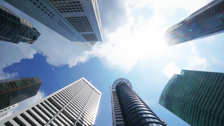 Singapore time lapse 4K, city skyline timelapse looking up under skyscraper building business district
