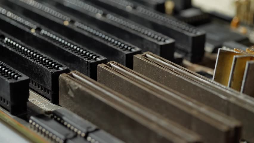 Slots for installing components and additional electronics on the motherboard close-up