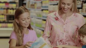 Financial data chart animation over woman and child shopping in grocery store. Finance, family, economy - Powered by Shutterstock - Get 15% off with code: PIKWIZARD15