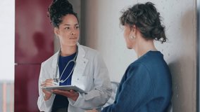 Doctor talking to patient explaining the treatment - Powered by Shutterstock - Get 15% off with code: PIKWIZARD15