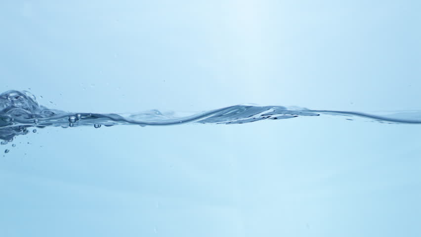 Blue Water Surface Ripple. Abstract Liquid Patterns in a Pure, Natural Environment.