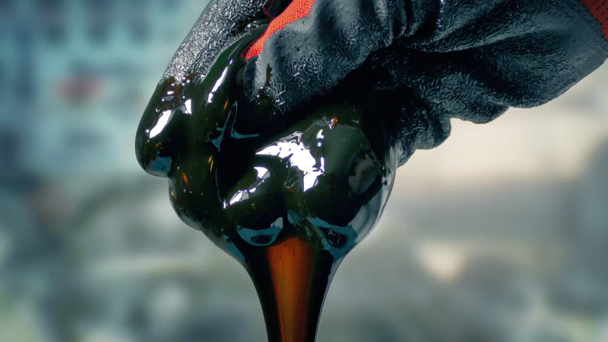 Crude Oil Checked For Quality By Petroleum Engineer