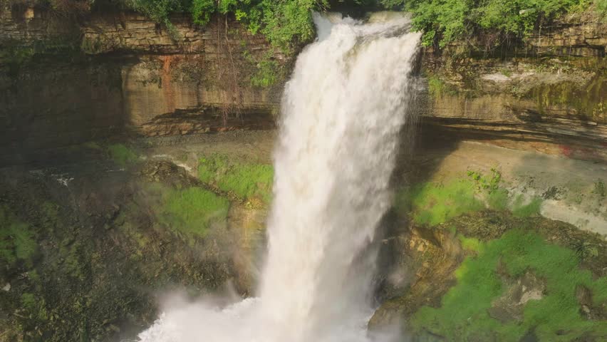 Profile view of famous Minnehaha Falls in Minnesota, USA. Drone shot..