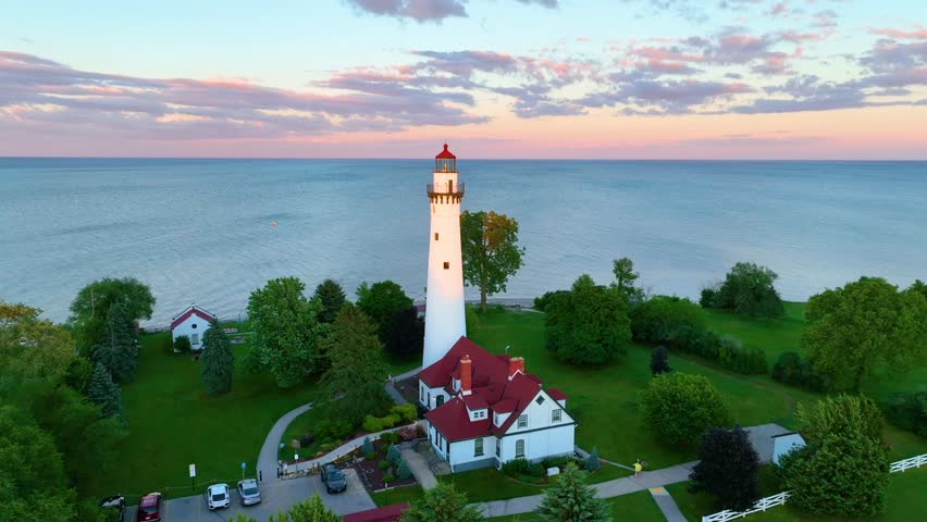 Aerial Arc Shot of Windpoint Lighthouse at Sunset in Racine Wisconsin