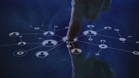 Animation of finger touching network of connections with icons on black background. Global technology, connections, computing and digital interface concept digitally generated video. - Powered by Shutterstock - Get 15% off with code: PIKWIZARD15